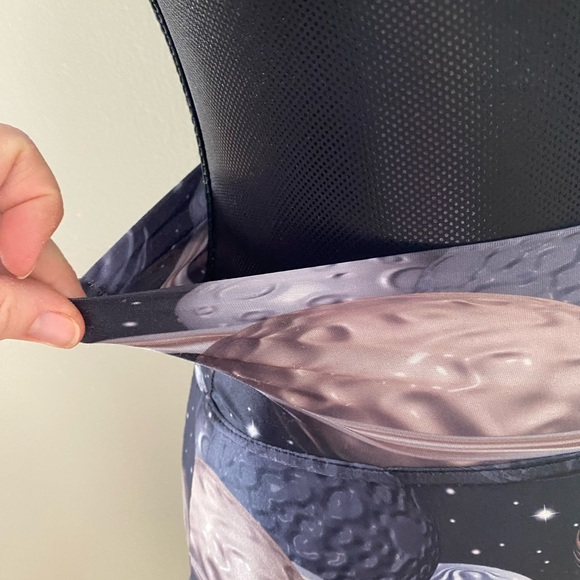 Light see through pencil stretchy skirt with planets on it. - Picture 3 of 3